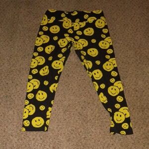 No Boundaries Black and Yellow Smiley Face Leggings